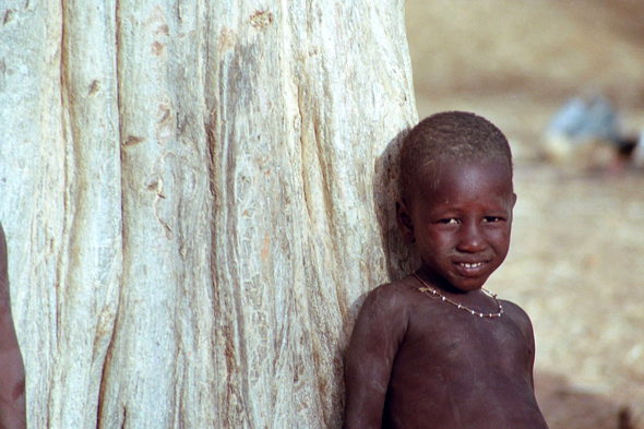 Kani Kombolé, enfant